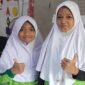 Siswi kelas 4A SD Negeri Borong Makassar, Kholbia dan Dita