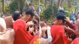 Tangkapan layar video memperlihatkan seorang pemuda yang sebelumnya disangka meninggal dunia akibat kecelakaan lalu lintas, tiba-tiba muncul dalam kondisi sehat dan menggegerkan rumah duka.