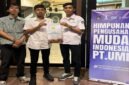 Ersan Satya Tang Jaya yang berdiri di tengah Calon ketua umum