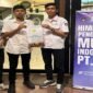 Ersan Satya Tang Jaya yang berdiri di tengah Calon ketua umum