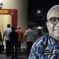 Kadis Perkimtan Gowa, Abdullah Sirajuddin, berada di Mapolres Gowa setelah ditetapkan sebagai tersangka dalam kasus dugaan korupsi penerbitan Persetujuan Bangunan Gedung (PBG). (Visual AI).