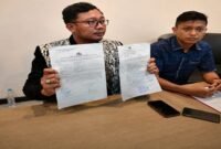 kuasa hukum pelapor, Wawan Nur Rewa saat konferensi Pers